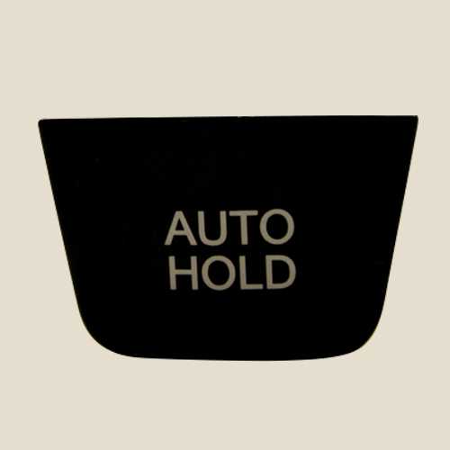 Auto hold button made by using injection molding  laser marking and painted using spray coating technique