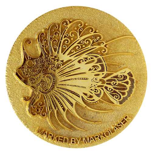 Fish artwork engraved and textured by deep laser engraving on coin die