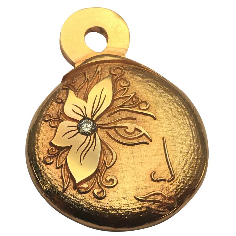 Deep laser engraving and texturing on gold pendant